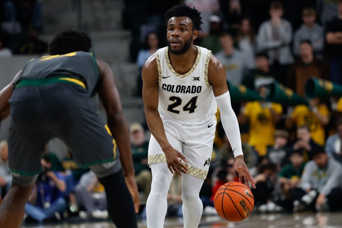 Feb 4, 2026; Waco, Texas, USA;  Colorado Buffaloes guard Barrington Hargress (24) dribbles against Baylor Bears guard Tounde Yessoufou (24) during the first half at Paul and Alejandra Foster Pavilion. Mandatory Credit: Chris Jones-Imagn Images