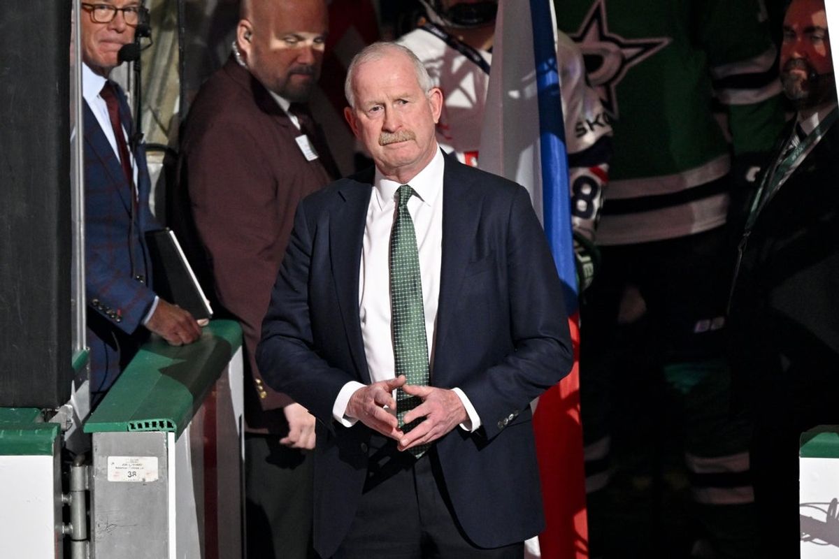 Feb 4, 2026; Dallas, Texas, USA; Dallas Stars general manager Jim Nill is celebrate as the Stars honor their 2026 Winter Olympics hockey players before the game against the St. Louis Blues at the American Airlines Center. Mandatory Credit: Jerome Miron-Imagn Images