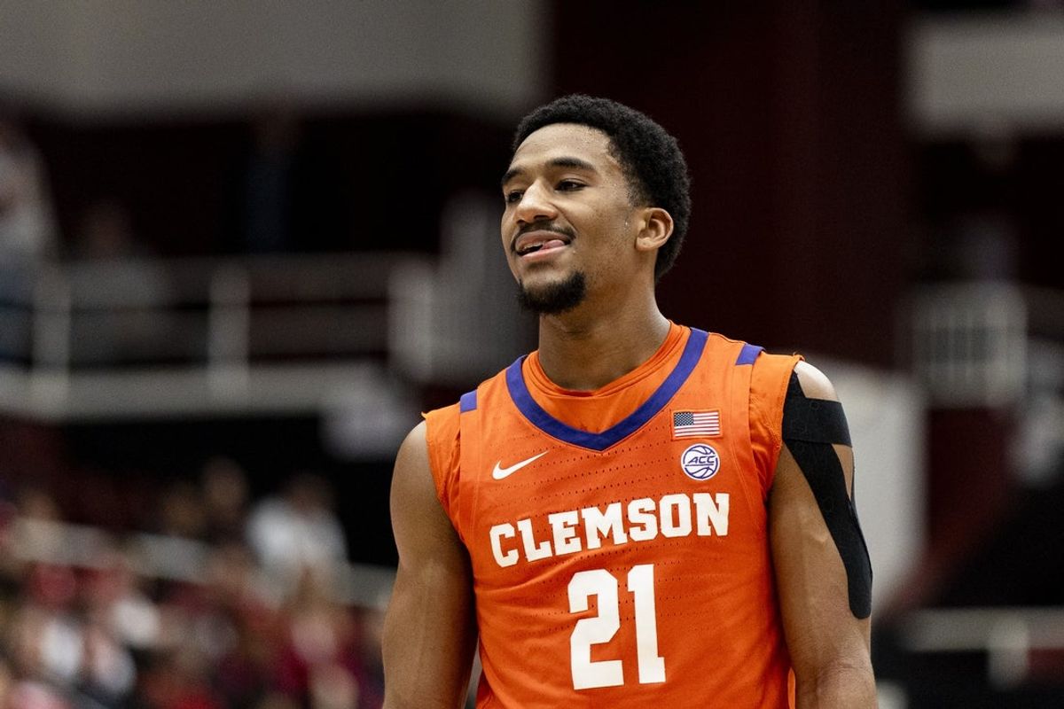 Feb 4, 2026; Stanford, California, USA;  Clemson Tigers guard Ace Buckner (21) smiles after making a free-throw against the Stanford Cardinal during the second half at Maples Pavilion. Mandatory Credit: John Hefti-Imagn Images