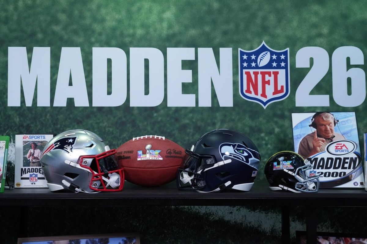 Feb 4, 2026; San Francisco, CA, USA; Seattle Seahawks and New England Patriots at a EA Sports Madden 26 display at the Super Bowl LX media center at the Moscone Center. Mandatory Credit: Kirby Lee-Imagn Images