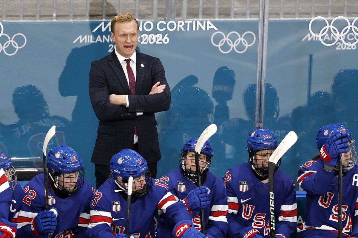 [US, Mexico & Canada customers only] Feb 5, 2026, Milan, ITALY; Team United States head coach John Wroblewski behind the bench against Team Czechia in women's ice hockey Group A play during the Milano Cortina 2026 Olympic Winter Games at Milano Rho Ice Hockey Arena. Mandatory Credit: David W Cerny/Reuters via Imagn Images