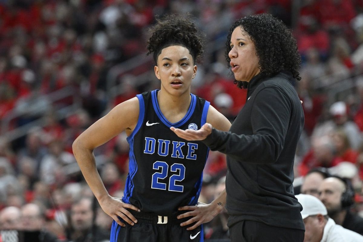 Feb 5, 2026; Louisville, Kentucky, USA;  Duke Blue Devils head coach Kara Lawson talks with guard Taina Mair (22)  during the first half against the Louisville Cardinals at KFC Yum! Center. Mandatory Credit: Jamie Rhodes-Imagn Images