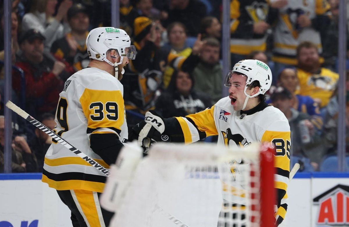 Feb 5, 2026; Buffalo, New York, USA;  Pittsburgh Penguins right wing Avery Hayes (85)  reacts after scoring his second goal of the game during the first period against the Buffalo Sabres at KeyBank Center. Mandatory Credit: Timothy T. Ludwig-Imagn Images