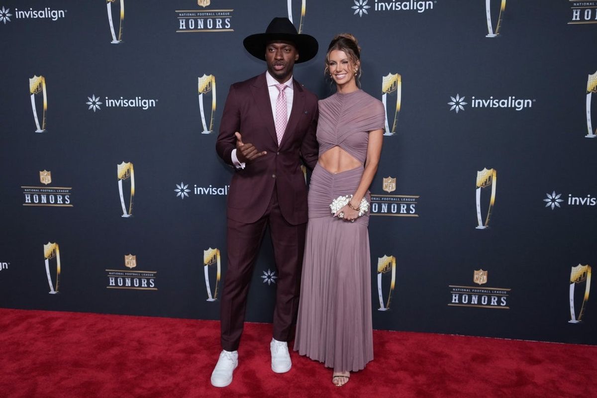 Feb 5, 2026; San Francisco, CA, USA; Robert Griffin III and hiw wife Grete Griffen on the NFL Honors Red Carpet before Super Bowl LX at Palace of Fine Arts. Mandatory Credit: Kirby Lee-Imagn Images