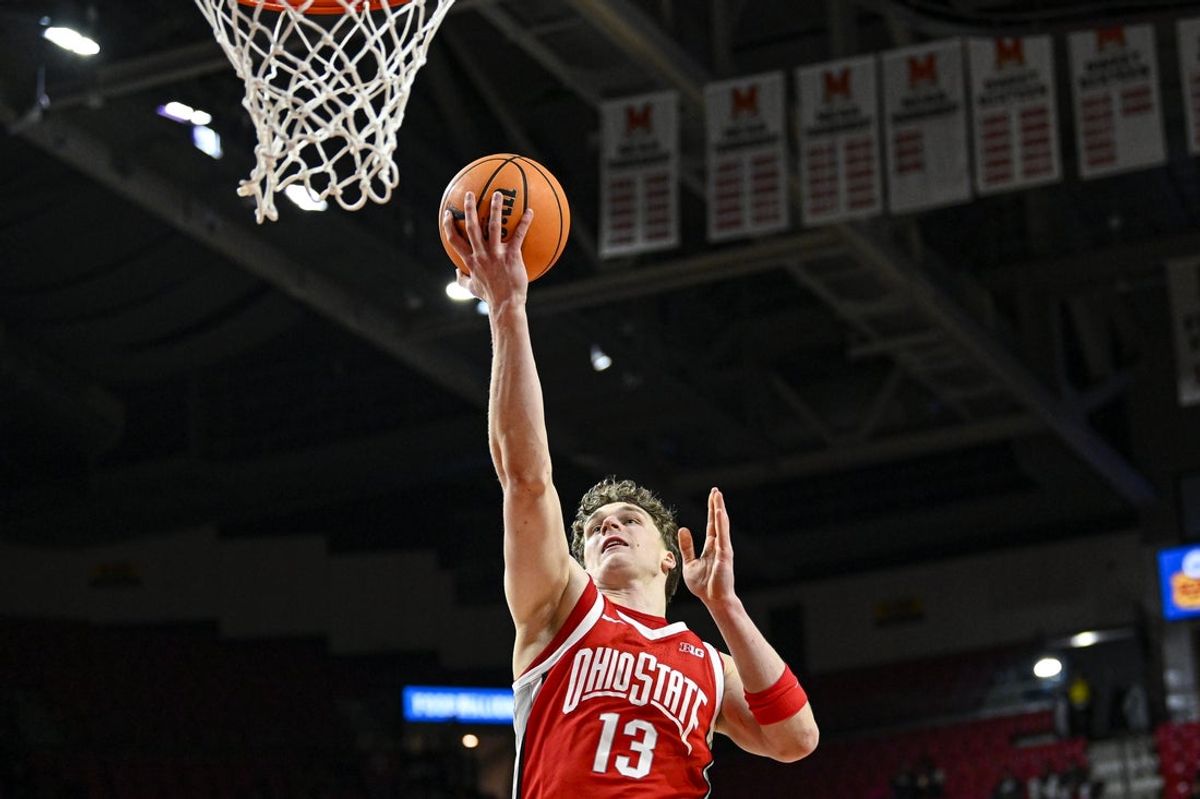 Feb 5, 2026; College Park, Maryland, USA; Ohio State Buckeyes center Christoph Tilly (13) shoots on a break away during the first half against the Maryland Terrapins  at Xfinity Center. Mandatory Credit: Tommy Gilligan-Imagn Images