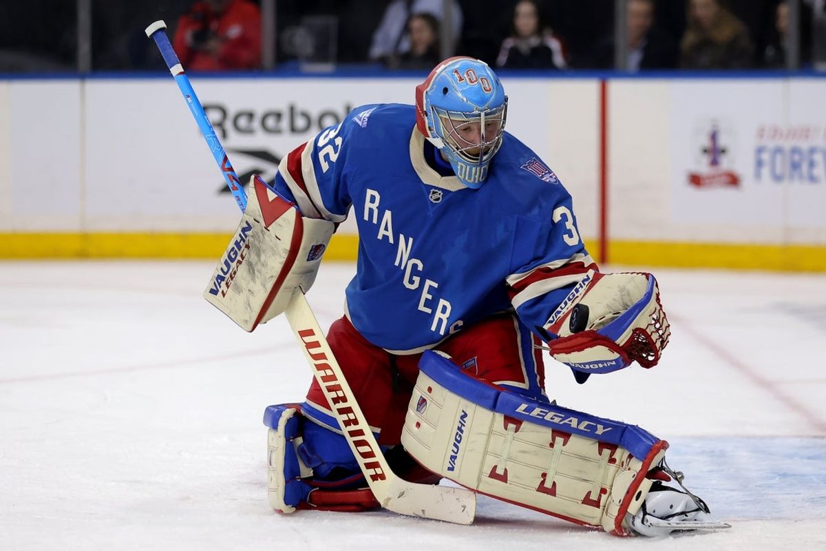 Feb 5, 2026; New York, New York, USA; New York Rangers goaltender Jonathan Quick (32) makes a save against the Carolina Hurricanes during the third period at Madison Square Garden. Mandatory Credit: Brad Penner-Imagn Images
