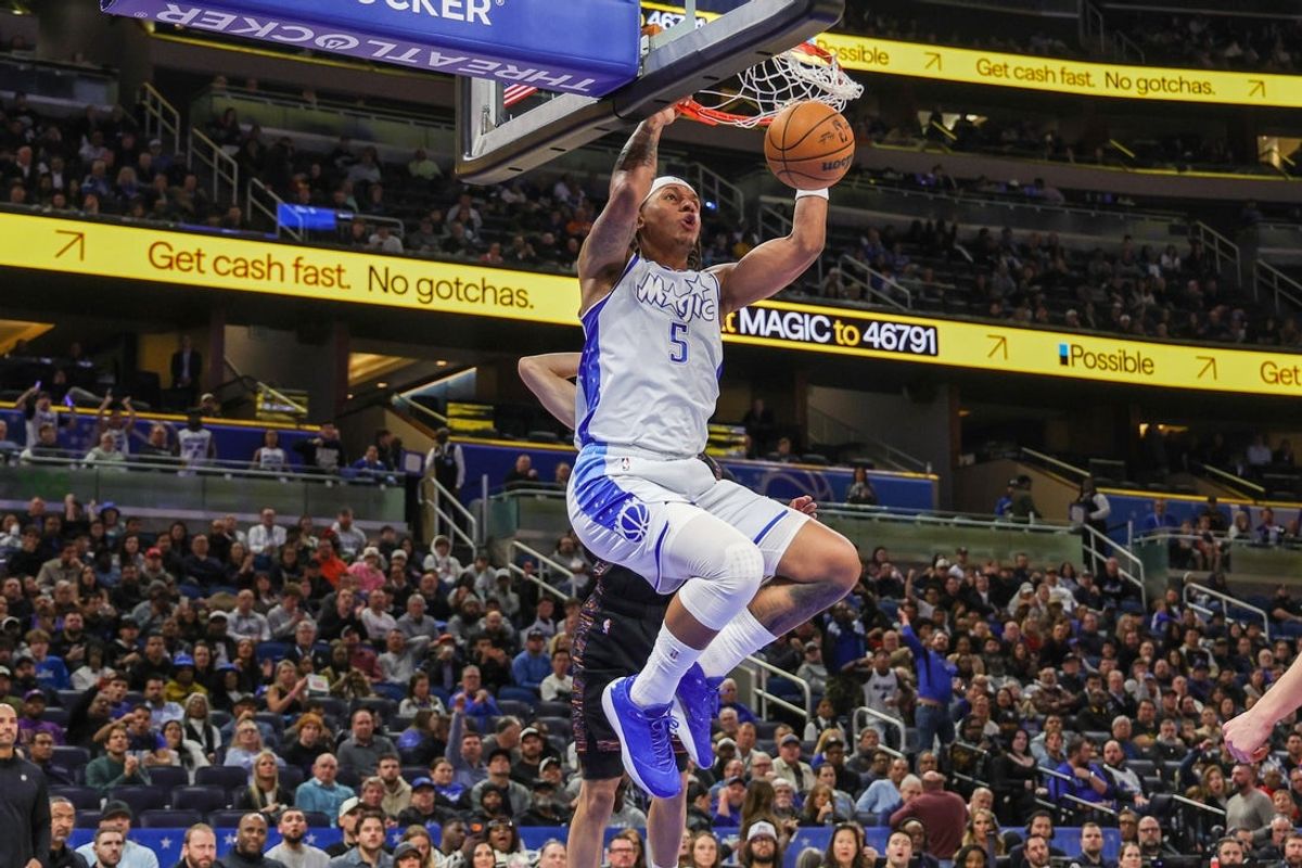Feb 5, 2026; Orlando, Florida, USA; Orlando Magic forward Paolo Banchero (5) dunks during the second half against the Brooklyn Nets at Kia Center. Mandatory Credit: Mike Watters-Imagn Images