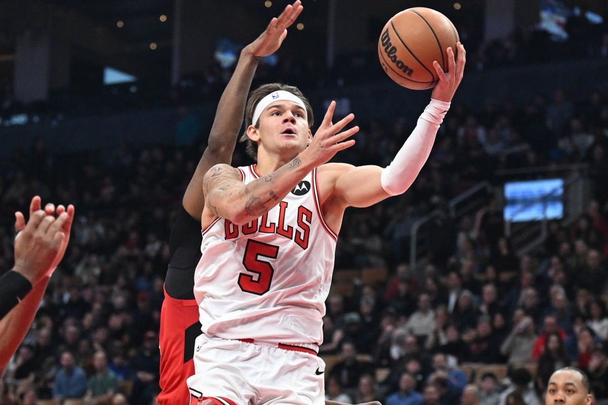 Feb 5, 2026; Toronto, Ontario, CAN;  Chicago Bulls guard Mac Mcclung (5) drives against the Toronto Raptors in the second half at Scotiabank Arena. Mandatory Credit: Dan Hamilton-Imagn Images