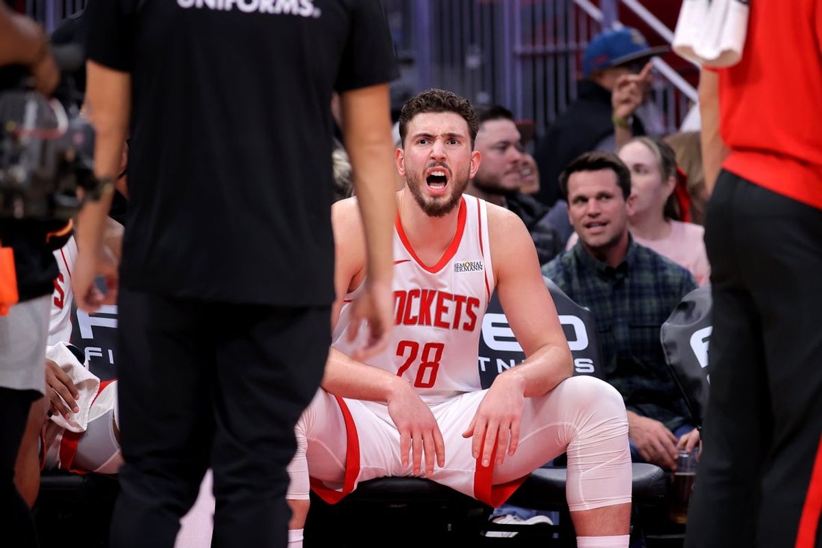 Feb 5, 2026; Houston, Texas, USA; Houston Rockets center Alperen Sengun (28) on the bench during a timeout against the Charlotte Hornets during the third quarter at Toyota Center. Mandatory Credit: Erik Williams-Imagn Images