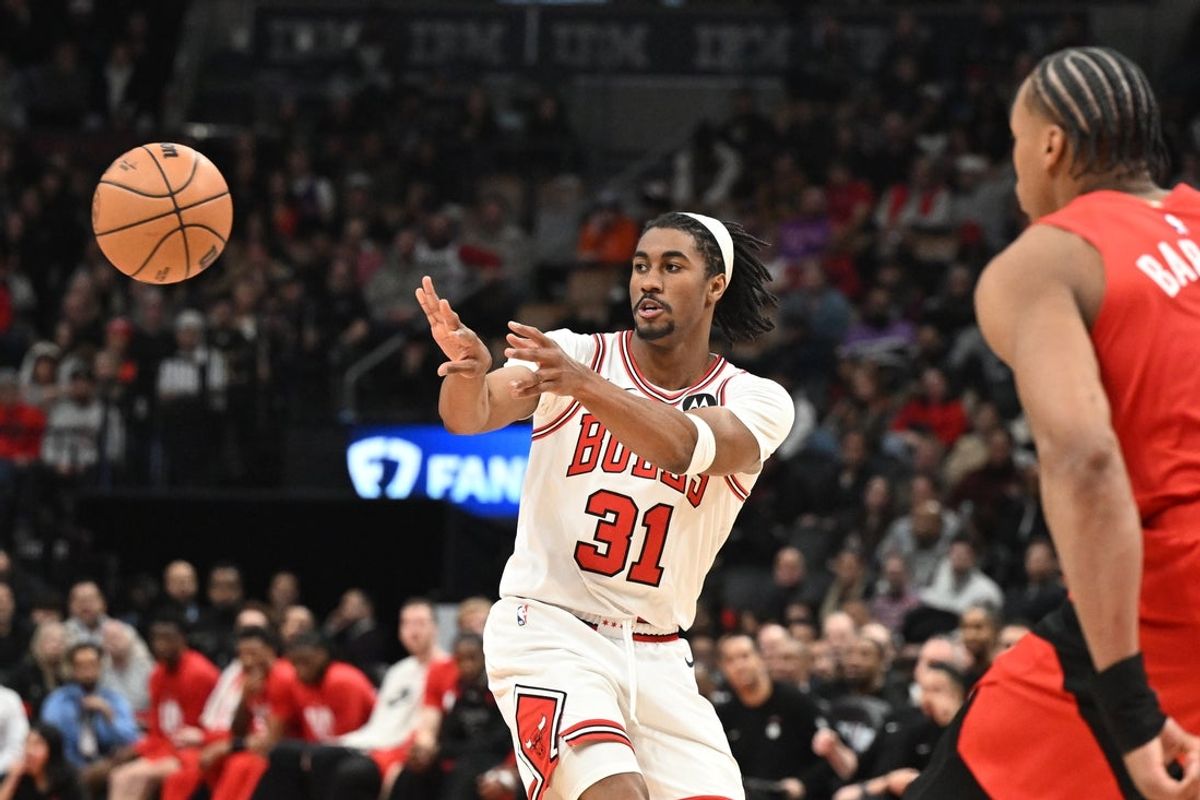 Feb 5, 2026; Toronto, Ontario, CAN;  Chicago Bulls guard Jaden Ivey (31) passes against the Toronto Raptors in the second half at Scotiabank Arena. Mandatory Credit: Dan Hamilton-Imagn Images