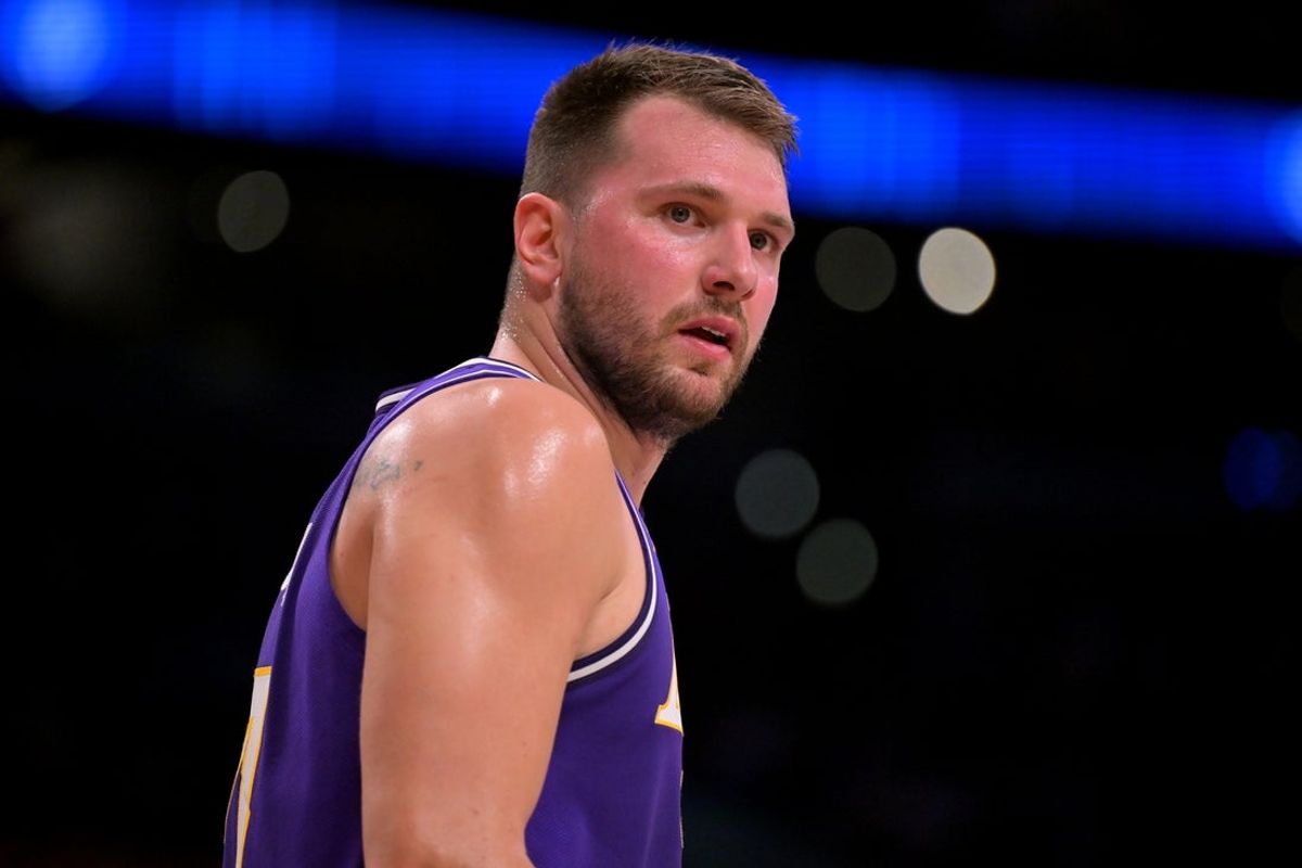 Feb 5, 2026; Los Angeles, California, USA;  Los Angeles Lakers guard Luka Doncic (77) looks on in the first half against the Philadelphia 76ers at Crypto.com Arena. Mandatory Credit: Jayne Kamin-Oncea-Imagn Images
