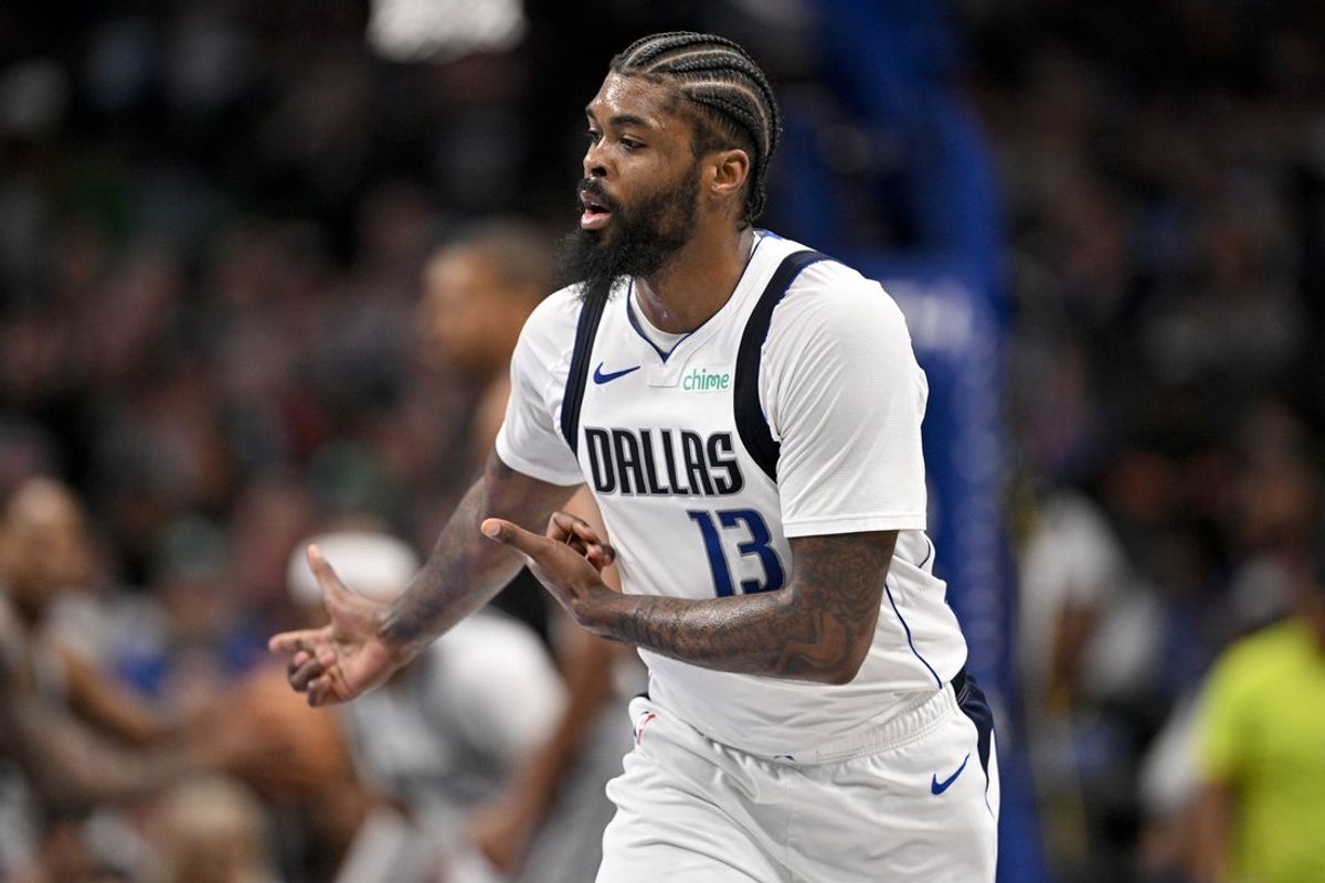 Feb 5, 2026; Dallas, Texas, USA; Dallas Mavericks forward Naji Marshall (13) celebrates making a three point shot against the San Antonio Spurs during the second half at the American Airlines Center. Mandatory Credit: Jerome Miron-Imagn Images