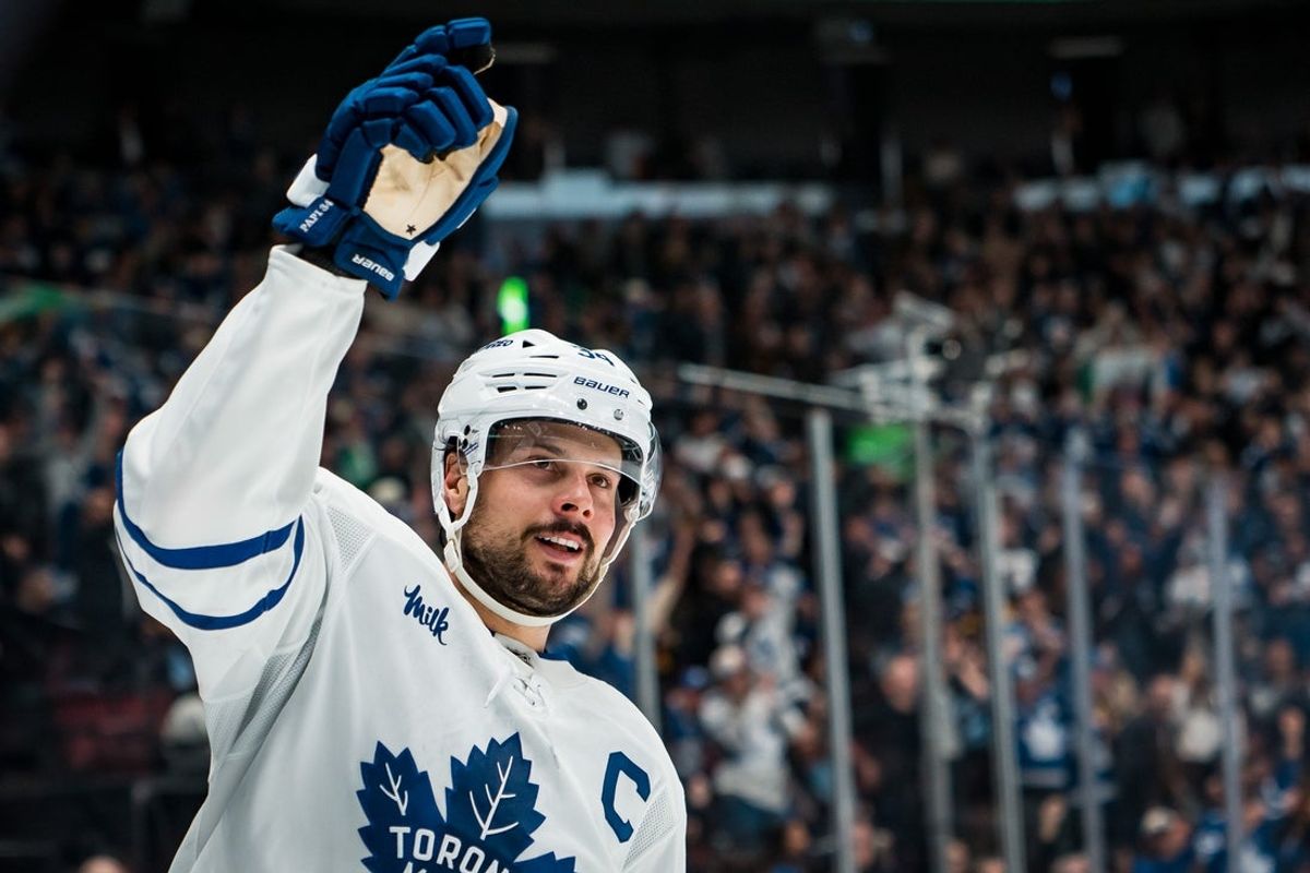 Jan 31, 2026; Vancouver, British Columbia, CAN; Toronto Maple Leafs forward Auston Matthews (34) celebrates his game winning shootout goal against the Vancouver Canucks at Rogers Arena. Mandatory Credit: Bob Frid-Imagn Images