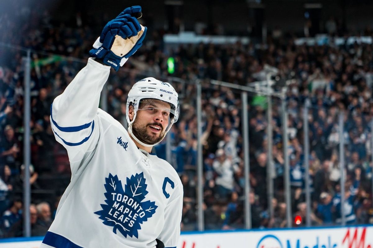 Jan 31, 2026; Vancouver, British Columbia, CAN; Toronto Maple Leafs forward Auston Matthews (34) celebrates his game winning shootout goal against the Vancouver Canucks at Rogers Arena. Mandatory Credit: Bob Frid-Imagn Images