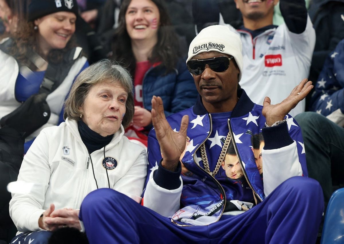 [US, Mexico & Canada customers only] Feb 6, 2026; Cortina d'Ampezzo, ITALY; Snoop Dogg watches a match of Korey Dropkin of United States with Cory Thiesse of United States against Brett Gallant of Canada and Jocelyn Peterman of Canada  during the curling mixed doubles round robin competition during the Milano Cortina 2026 Olympic Winter Games at the Cortina Curling Olympic Stadium. Mandatory Credit: Issei Kato/Reuters via Imagn Images
