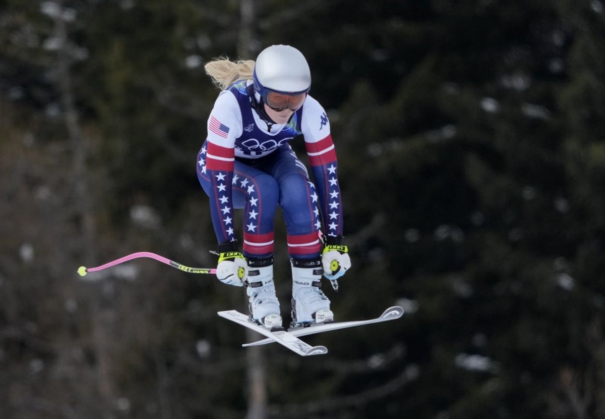 Feb 6, 2026; Cortina d'Ampezzo, ITALY; Lindsey Vonn of the United States in women's downhill training during the Milano Cortina 2026 Olympic Winter Games at Tofane Alpine Skiing Centre. Mandatory Credit: Michael Madrid-Imagn Images