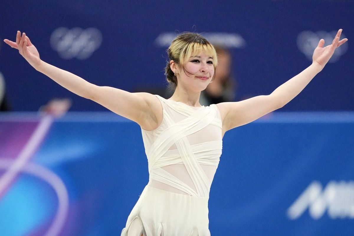Feb 6, 2026; Milan, Italy; Alysa Liu of the United States competes in women's singles short program during the Milano Cortina 2026 Olympic Winter Games at Milano Ice Skating Arena. Mandatory Credit: James Lang-Imagn Images