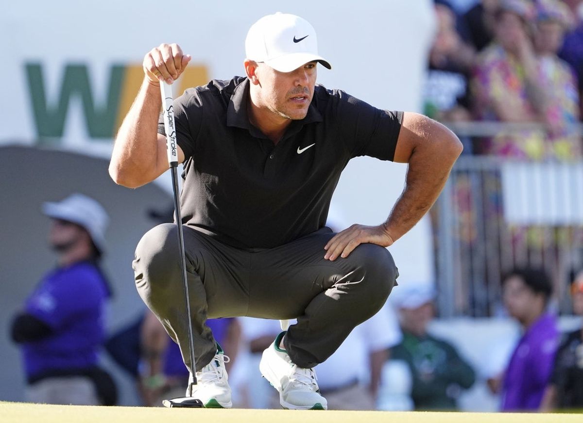 Brooks Koepka looks over his putt on the 16th hole during Round 2 at the WM Phoenix Open on Feb. 6, 2026, at TPC Scottsdale.