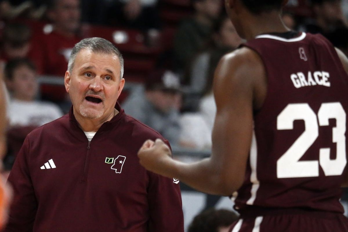 Feb 7, 2026; Starkville, Mississippi, USA; Mississippi State Bulldogs head coach Chris Jans reacts toward guard King Grace (23) during the second half against the Arkansas Razorbacks at Humphrey Coliseum. Mandatory Credit: Petre Thomas-Imagn Images