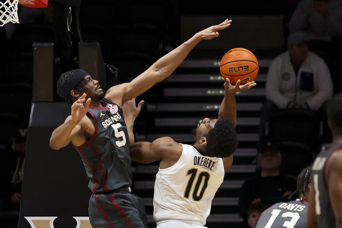 Feb 7, 2026; Nashville, Tennessee, USA;  Oklahoma Sooners forward Mohamed Wague (5) blocks the shot of Vanderbilt Commodores forward Ak Okereke (10) during the first half at Memorial Gymnasium. Mandatory Credit: Steve Roberts-Imagn Images
