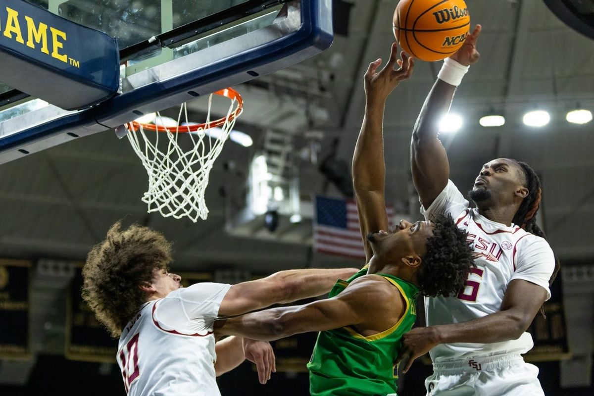 Feb 7, 2026; South Bend, Indiana, USA; Florida State Seminoles guard Robert McCray V. (6) blocks Notre Dame Fighting Irish forward Jalen Haralson (10) as guard Lajae Jones (10) also defends during the first half at Purcell Pavilion at the Joyce Center. Mandatory Credit: Michael Caterina-Imagn Images