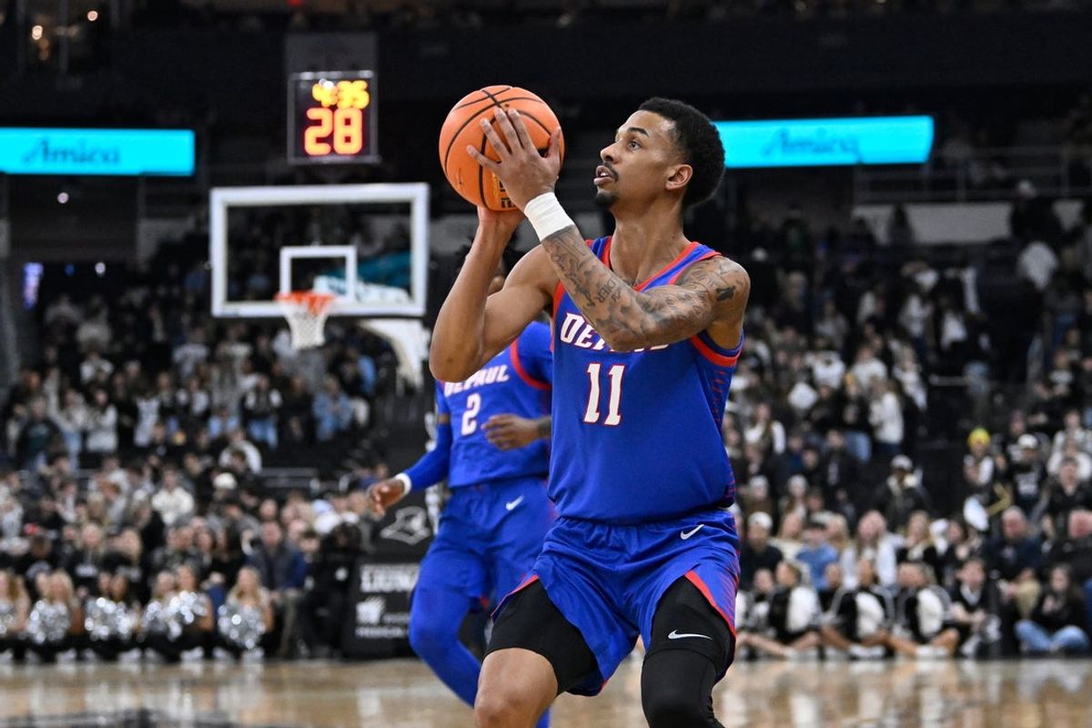 Feb 7, 2026; Providence, Rhode Island, USA; DePaul Blue Demons guard CJ Gunn (11) shoots the ball during the second half against the Providence Friars at Amica Mutual Pavilion. Mandatory Credit: Eric Canha-Imagn Images