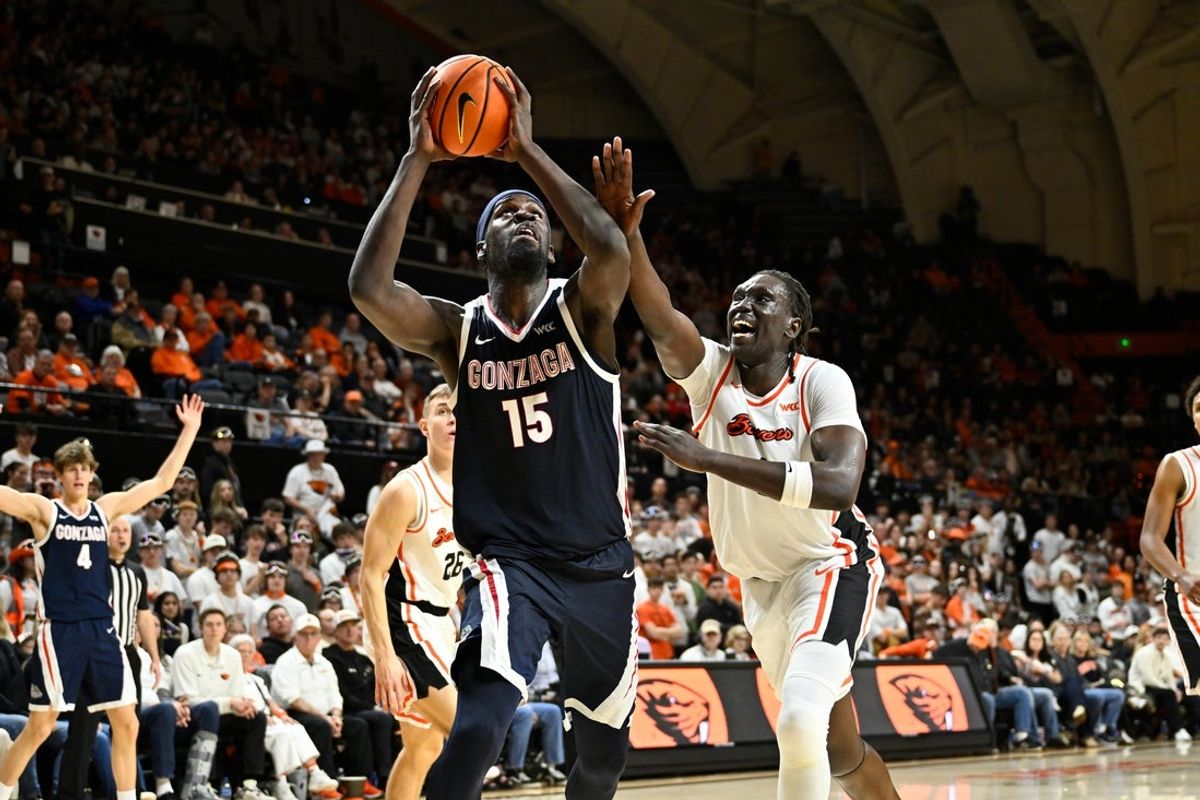 Feb 7, 2026; Corvallis, Oregon, USA; Gonzaga Bulldogs forward Graham Ike (15) drives against Oregon State Beavers center Yaak Yaak (4) during the second half at Gill Coliseum. Mandatory Credit: Craig Strobeck-Imagn Images