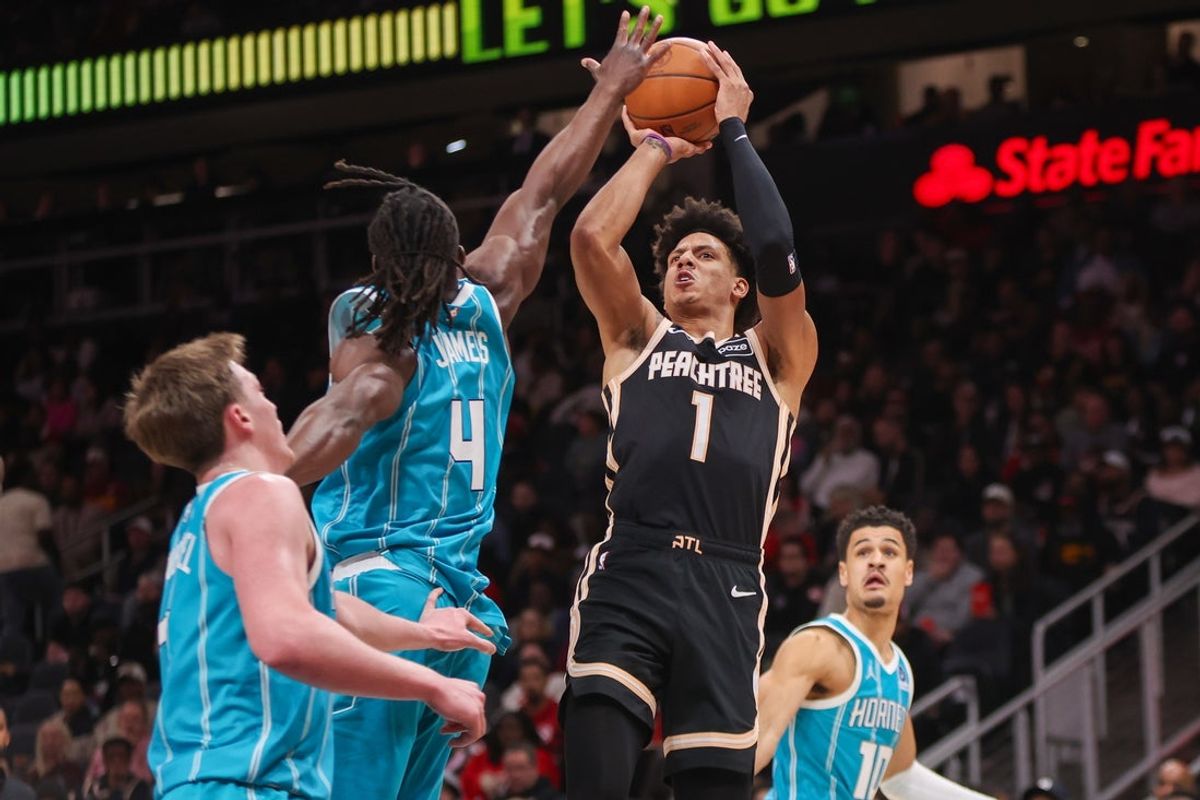 Feb 7, 2026; Atlanta, Georgia, USA; Atlanta Hawks forward Jalen Johnson (1) shoots over Charlotte Hornets guard Sion James (4) in the second quarter at State Farm Arena. Mandatory Credit: Brett Davis-Imagn Images
