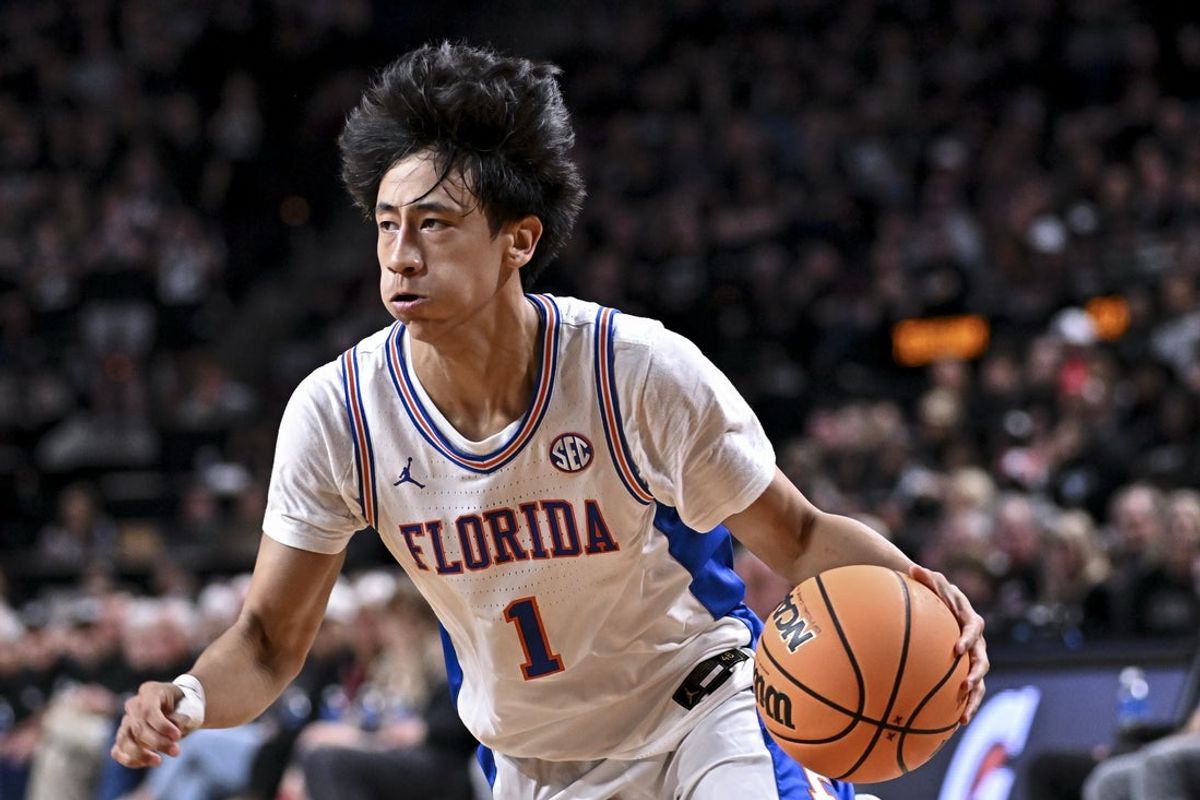 Feb 7, 2026; College Station, Texas, USA; Florida Gators guard Xaivian Lee (1) controls the ball during the first half against the Texas A&M Aggies at Reed Arena. Mandatory Credit: Maria Lysaker-Imagn Images