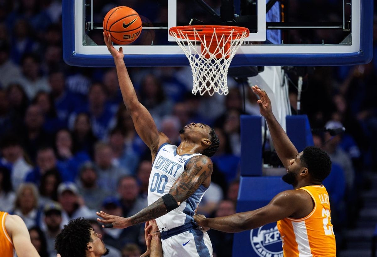 Feb 7, 2026; Lexington, Kentucky, USA; Kentucky Wildcats guard Otega Oweh (00) scores a layup during the first half against the Tennessee Volunteers at Rupp Arena at Central Bank Center. Mandatory Credit: Jordan Prather-Imagn Images