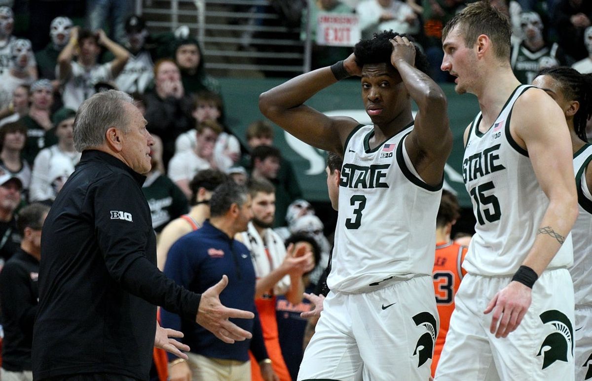 Feb 7, 2026; East Lansing, Michigan, USA;  Michigan State Spartans head coach Tom Izzo reacts with Michigan State Spartans forward Cameron Ward (3) and Michigan State Spartans center Carson Cooper (15) after a foul call late in the second half against the Illinois Fighting Illini at Jack Breslin Student Events Center. Mandatory Credit: Dale Young-Imagn Images