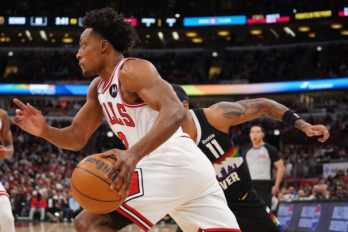 Feb 7, 2026; Chicago, Illinois, USA; Denver Nuggets guard Bruce Brown (11) defends Chicago Bulls guard Collin Sexton (2) during the second half at United Center. Mandatory Credit: David Banks-Imagn Images