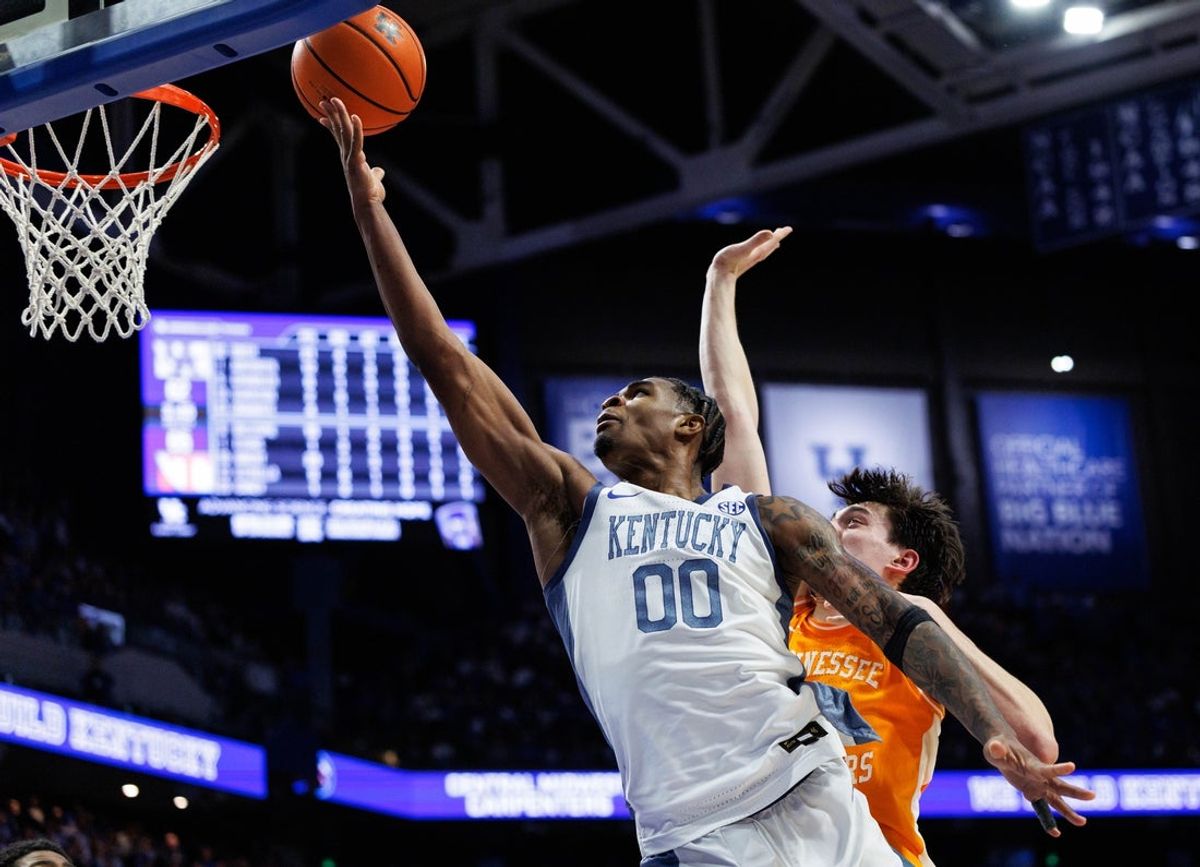 Feb 7, 2026; Lexington, Kentucky, USA; Kentucky Wildcats guard Otega Oweh (00) goes to the basket during the second half against the Tennessee Volunteers at Rupp Arena at Central Bank Center. Mandatory Credit: Jordan Prather-Imagn Images