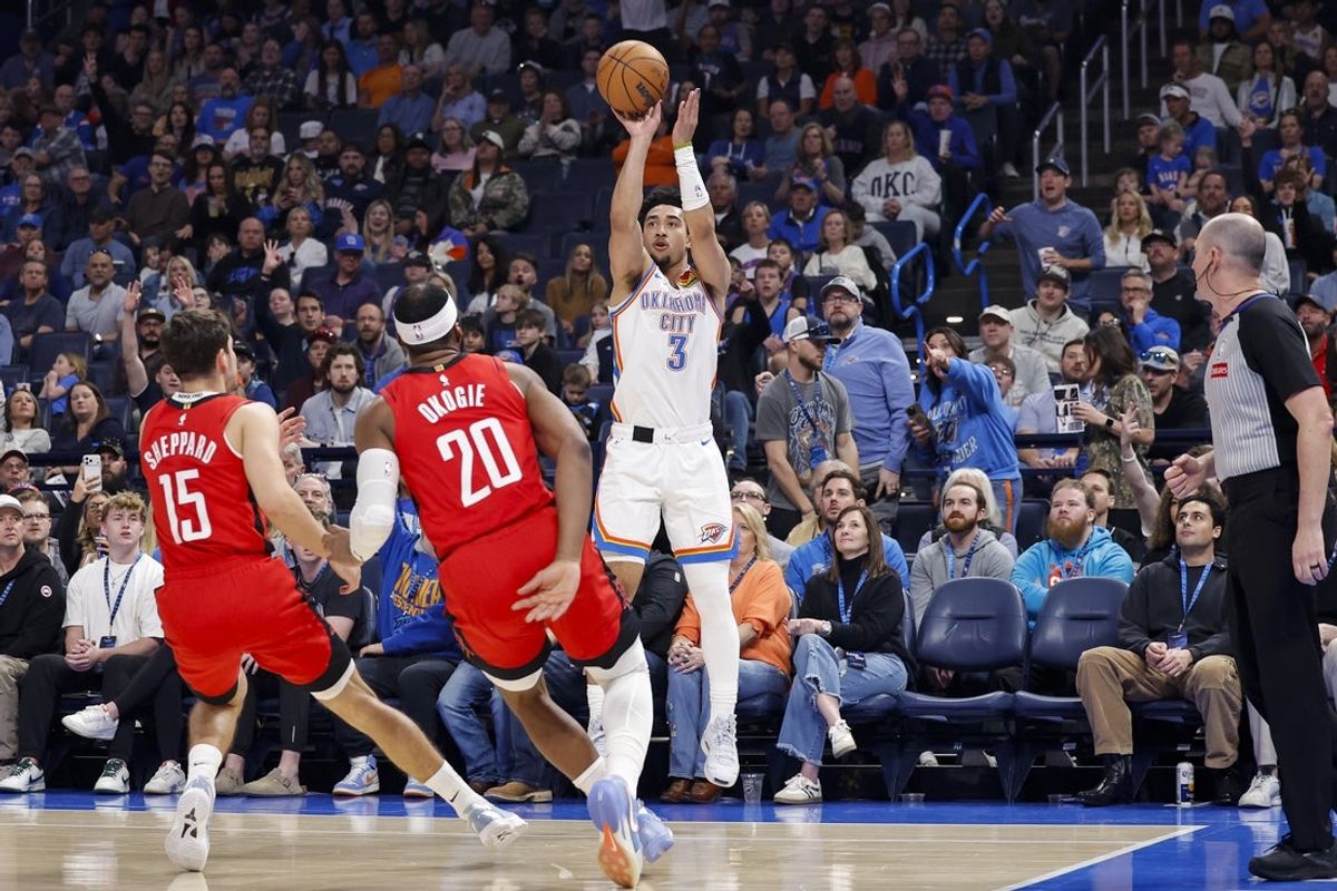Feb 7, 2026; Oklahoma City, Oklahoma, USA; Oklahoma City Thunder guard Jared McCain (3) shoots against the Houston Rockets during the first half at Paycom Center. Mandatory Credit: Alonzo Adams-Imagn Images