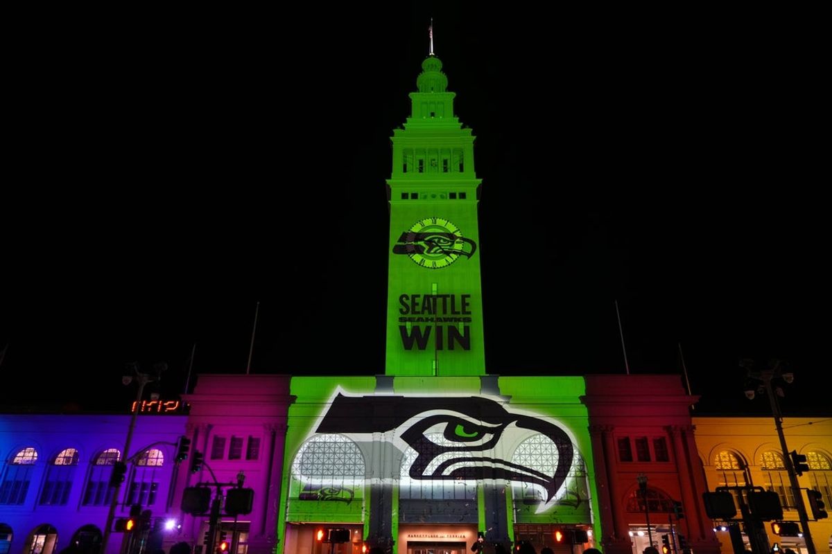Feb 6, 2026; San Francisco, CA, USA; The Seattle Seahawks logo is projected on the Ferry Building. Mandatory Credit: Kirby Lee-Imagn Images