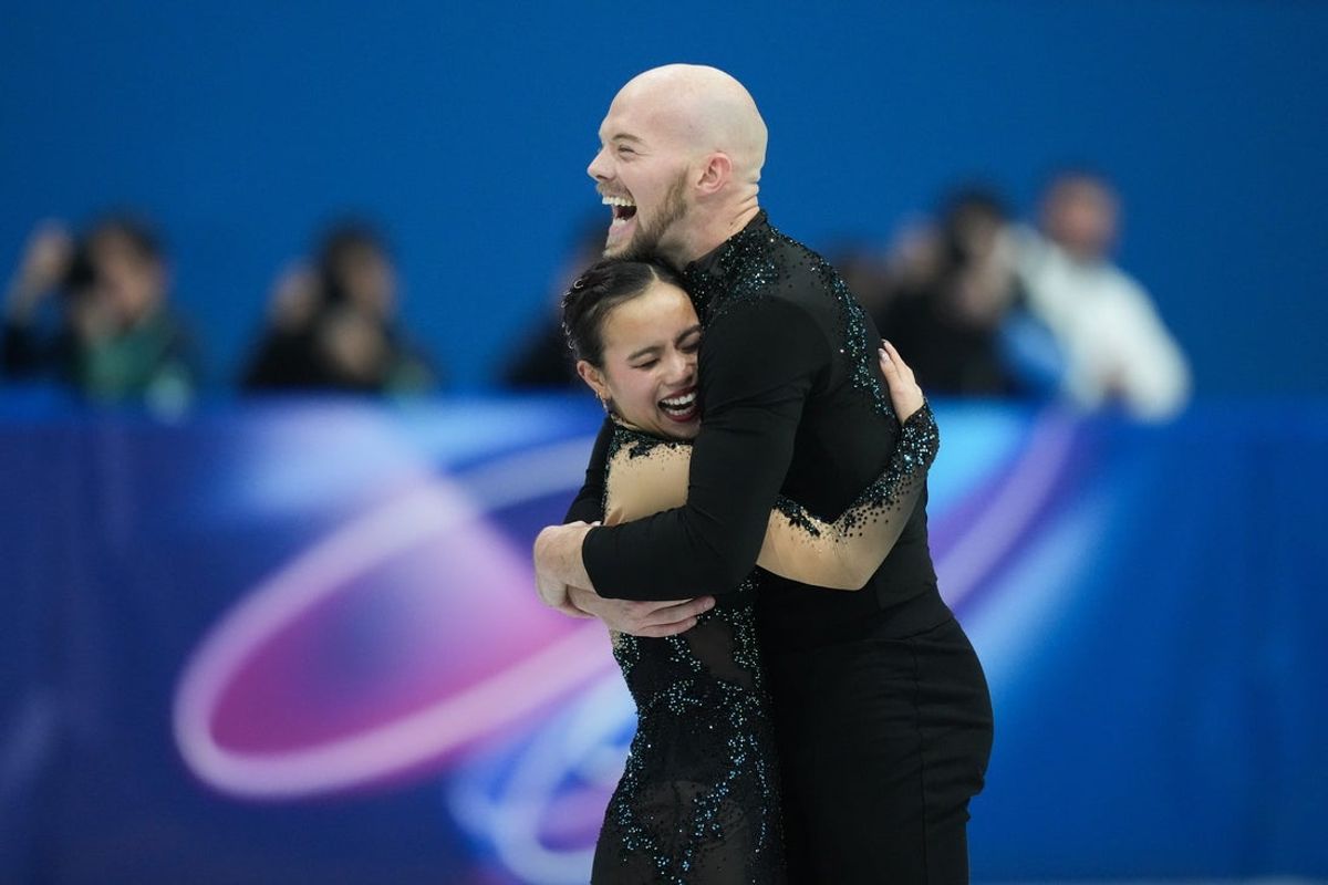 Feb 8, 2026; Milan, Italy; Ellie Kam and Danny O'Shea of the United States of America react after performing in the pair skating finals during the Milano Cortina 2026 Olympic Winter Games at Milano Ice Skating Arena. Mandatory Credit: James Lang-Imagn Images