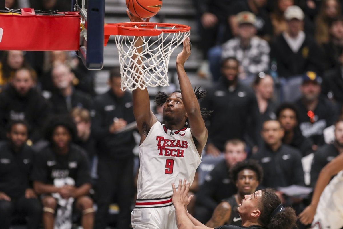 Feb 8, 2026; Morgantown, West Virginia, USA; Texas Tech Red Raiders forward Luke Bamgboye (9) shoots during the first half against the West Virginia Mountaineers at Hope Coliseum. Mandatory Credit: Ben Queen-Imagn Images