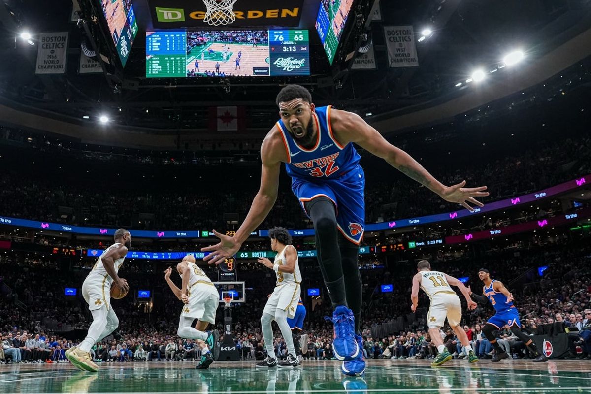 Feb 8, 2026; Boston, Massachusetts, USA; New York Knicks center Karl-Anthony Towns (32) reacts after a play against the Boston Celtics in the second half at TD Garden. Mandatory Credit: David Butler II-Imagn Images