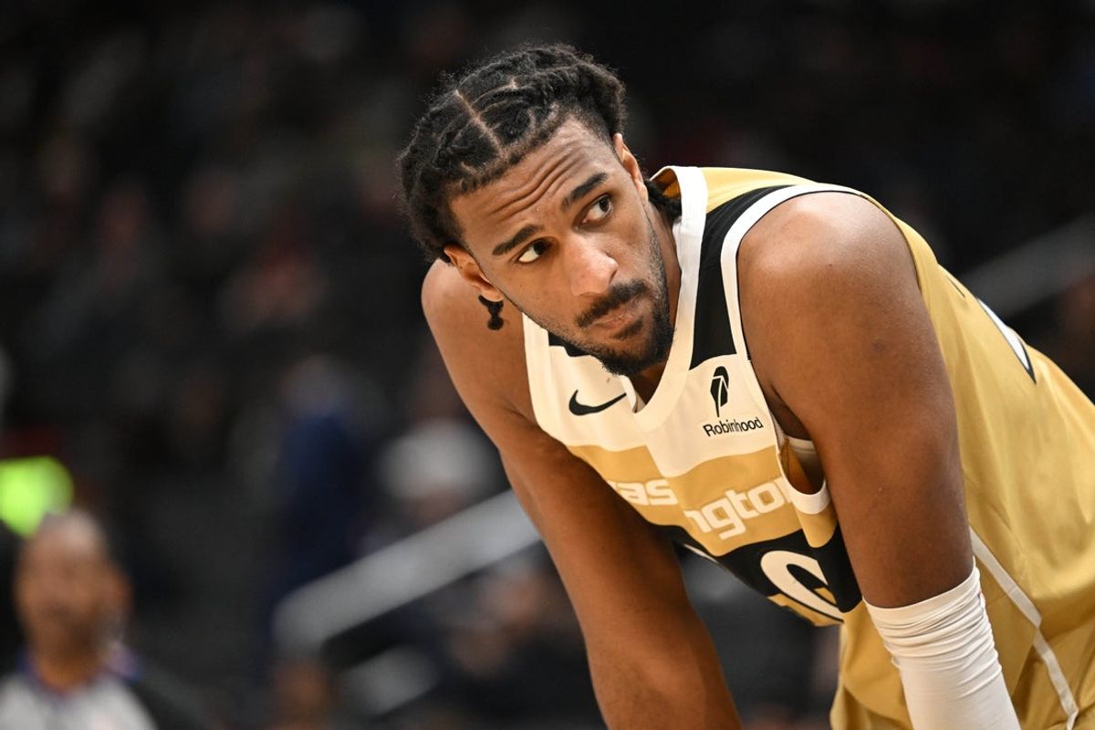 Feb 8, 2026; Washington, District of Columbia, USA;  Washington Wizards center Alex Sarr (20) looks up during a free throw against the Miami Heat during the third quarter at Capital One Arena. Mandatory Credit: Rafael Suanes-Imagn Images