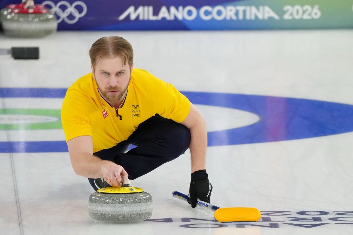 Feb 9, 2026; Cortina d'Ampezzo, Italy; Rasmus Wranaa of Sweden during a curling semifinal match during the Milano Cortina 2026 Olympic Winter Games at Cortina Curling Olympic Stadium. Mandatory Credit: Eric Bolte-Imagn Images