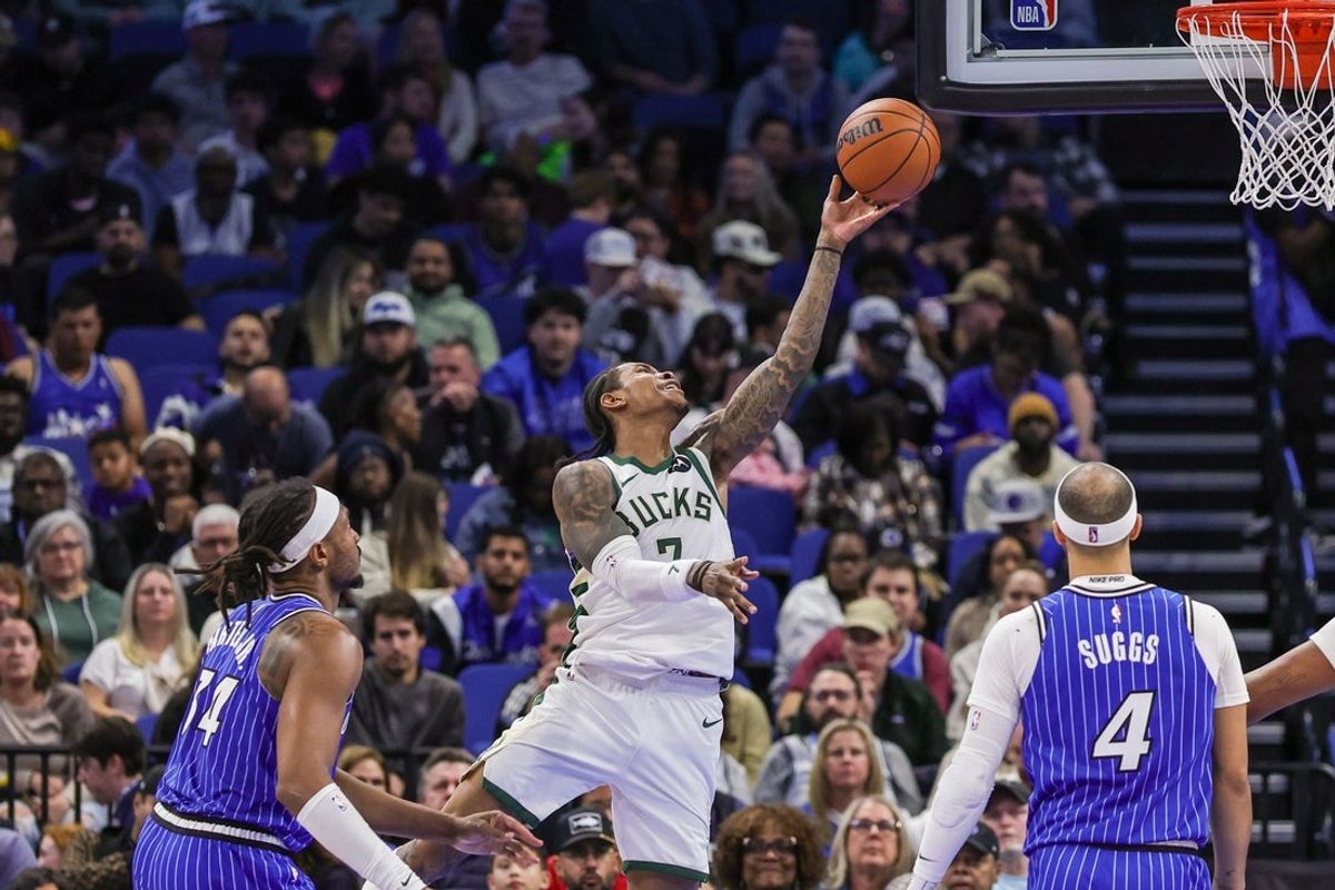 Feb 9, 2026; Orlando, Florida, USA; Milwaukee Bucks guard Kevin Porter Jr. (7) goes to the basket during the second half against the Orlando Magic at Kia Center. Mandatory Credit: Mike Watters-Imagn Images