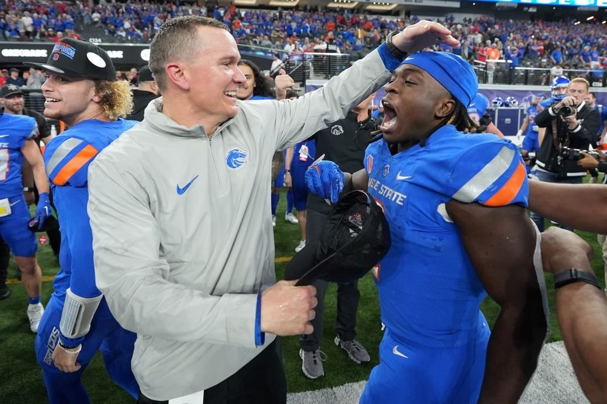 Dec 2, 2023; Las Vegas, NV, USA; Boise State Broncos head coach Spencer Danielson celebrates with running back Ashton Jeanty (2) after 44-20 victory over the UNLV Rebels in the Mountain West Championship at Allegiant Stadium.