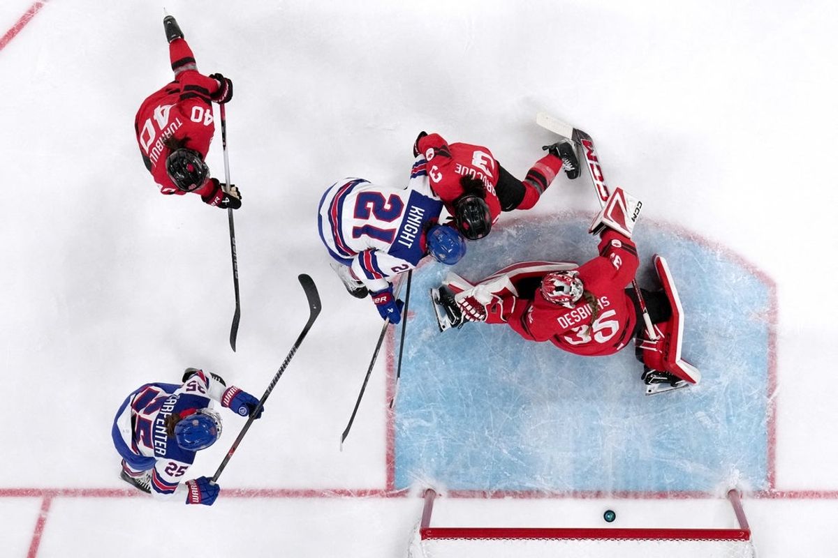 [US, Mexico & Canada customers only] Feb 10, 2026; Milan, Italy; Ann-Renee Desbiens (35) of Canada gives up a goal to Caroline Harvey (not pictured) of the United States in women's ice hockey group a play during the Milano Cortina 2026 Olympic Winter Games at Milano Santagiulia Ice Hockey Arena. Mandatory Credit: David W Cerny/Reuters via Imagn Images