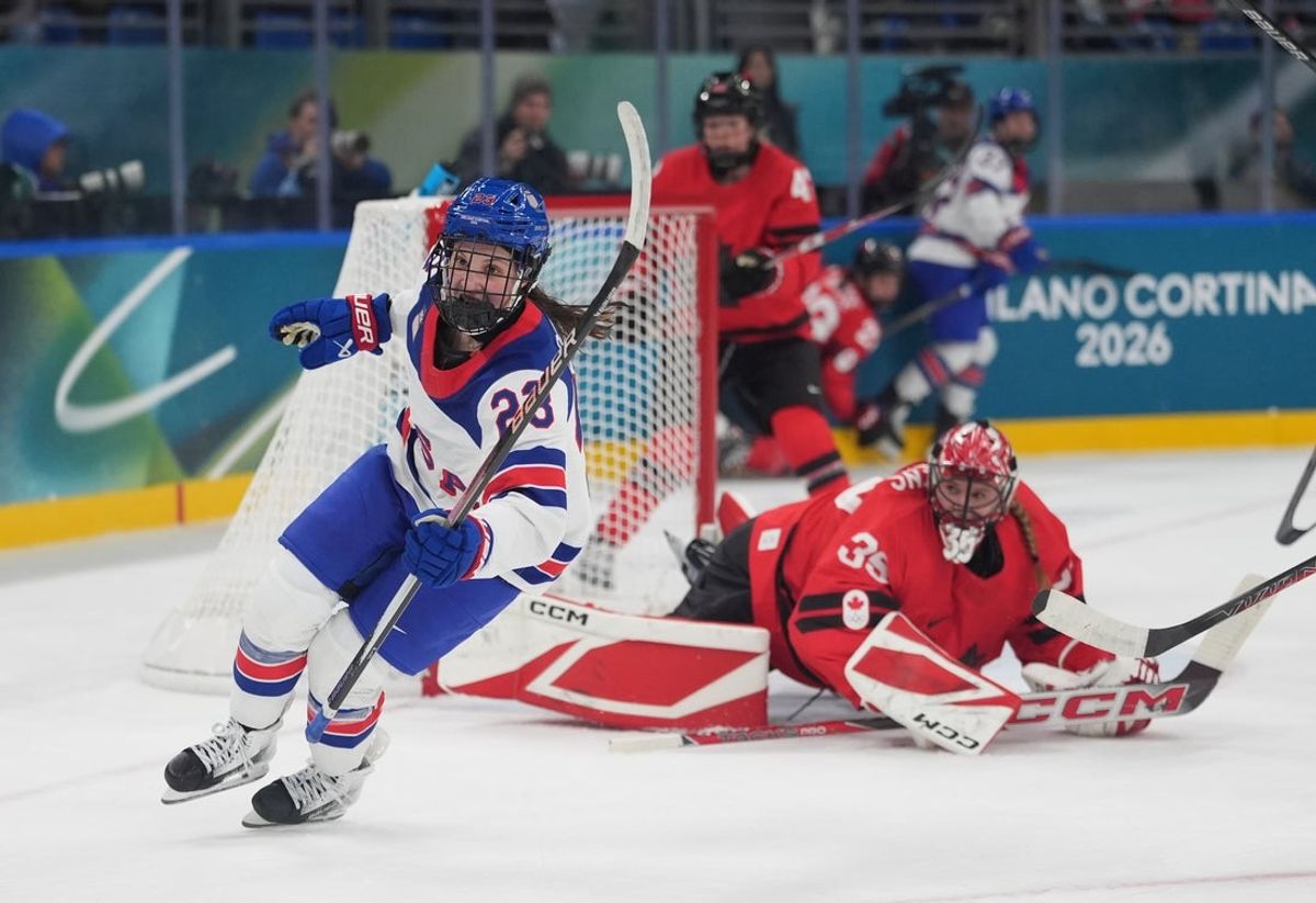 Feb 10, 2026; Milan, Italy; Hannah Bilka (23) of the United States scores a goal past Ann-Renee Desbiens (35) of Canada in women's ice hockey group A play during the Milano Cortina 2026 Olympic Winter Games at Milano Santagiulia Ice Hockey Arena. Mandatory Credit: Amber Searls-Imagn Images