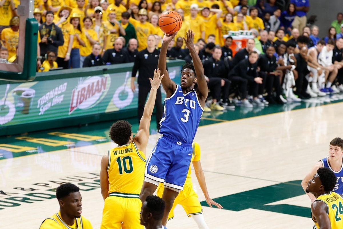 Feb 10, 2026; Waco, Texas, USA;  BYU Cougars forward AJ Dybantsa (3) scores a basket against Baylor Bears guard Isaac Williams (10) during the first half at Paul and Alejandra Foster Pavilion. Mandatory Credit: Chris Jones-Imagn Images