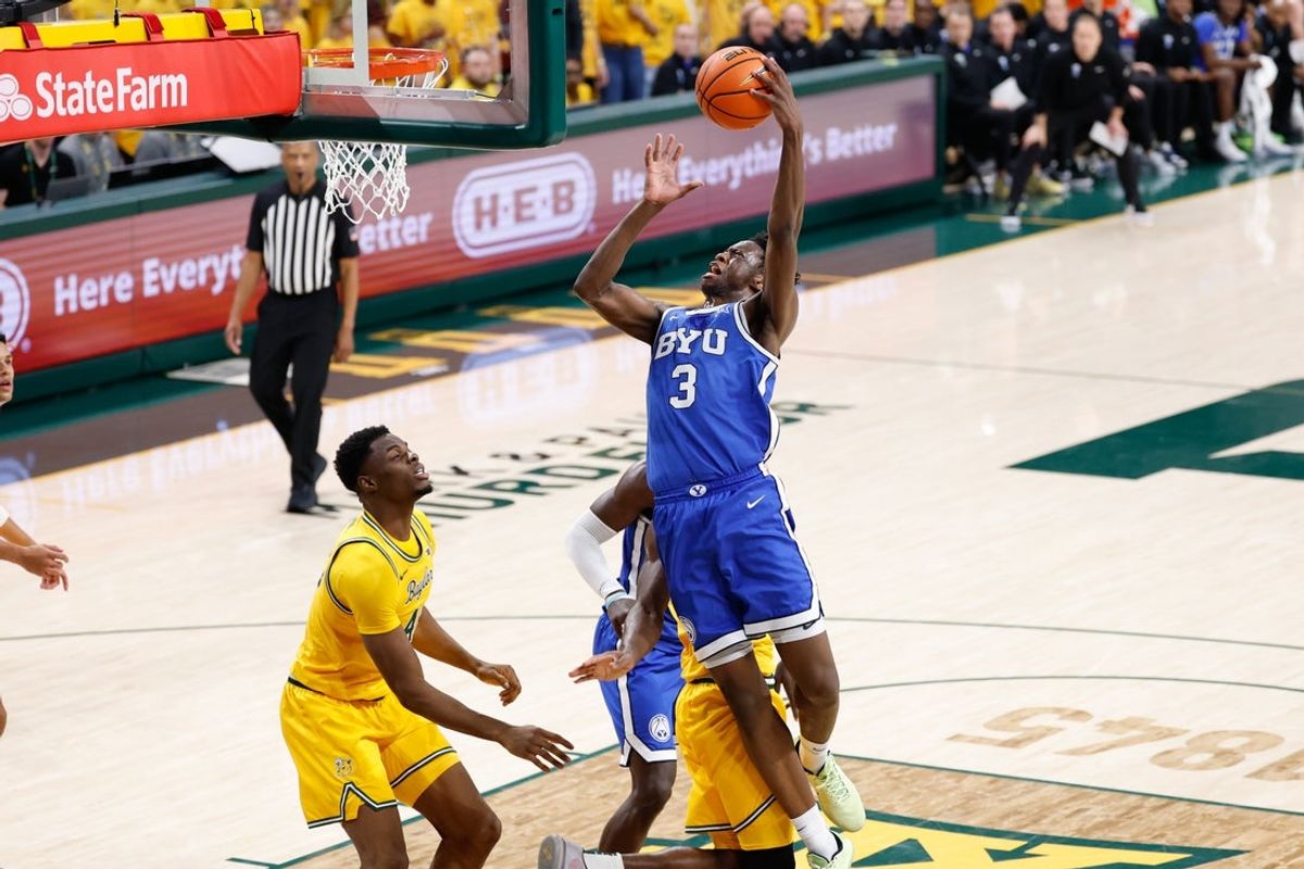 Feb 10, 2026; Waco, Texas, USA;  BYU Cougars forward AJ Dybantsa (3) scores a basket against Baylor Bears center James Nnaji (46) during the first half at Paul and Alejandra Foster Pavilion. Mandatory Credit: Chris Jones-Imagn Images