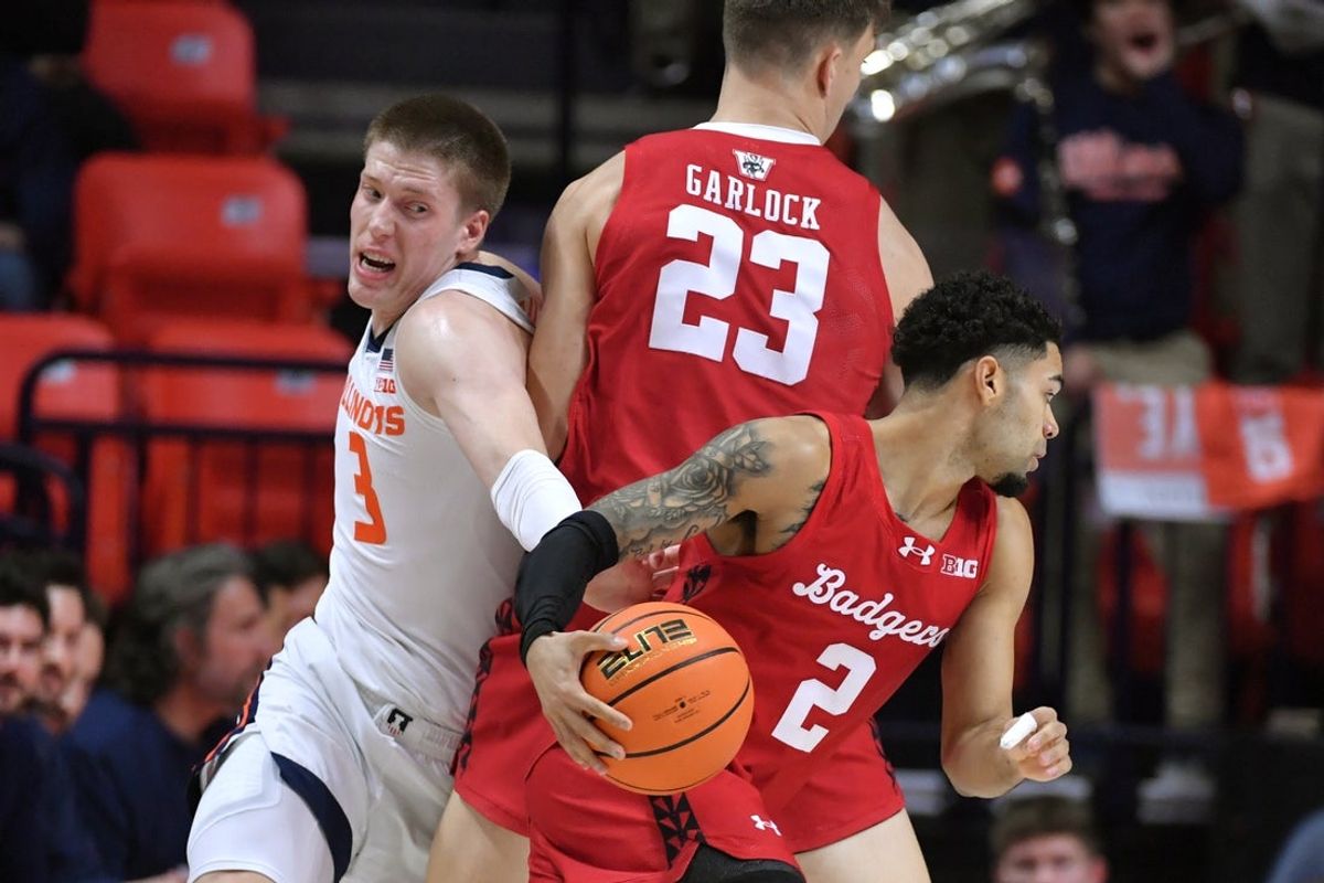 Feb 10, 2026; Champaign, Illinois, USA;  Wisconsin Badgers forward Will Garlock (23) screens Illinois Fighting Illini forward Ben Humrichhous (3) as guard Nick Boyd (2) drives the ball during the first half at State Farm Center. Mandatory Credit: Ron Johnson-Imagn Images