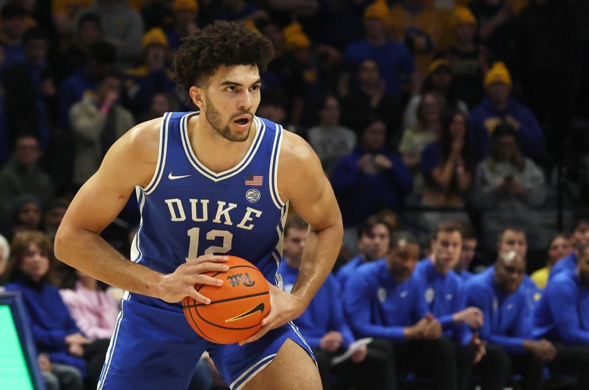 Feb 10, 2026; Pittsburgh, Pennsylvania, USA;  Duke Blue Devils forward Cameron Boozer (12) handles the ball against the Pittsburgh Panthers during the first half at Petersen Events Center. Mandatory Credit: Charles LeClaire-Imagn Images