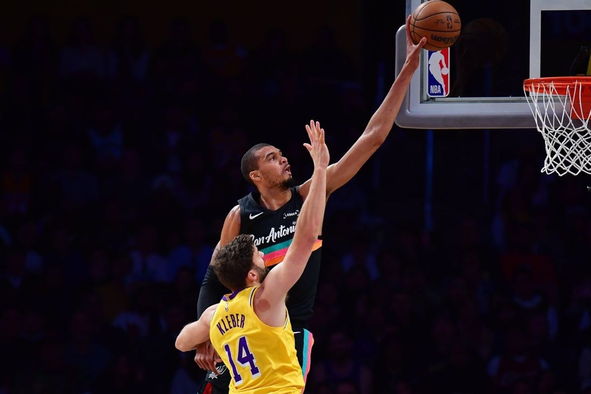 Feb 10, 2026; Los Angeles, California, USA; San Antonio Spurs forward Victor Wembanyama (1) shoots against Los Angeles Lakers forward Maxi Kleber (14) during the first half at Crypto.com Arena. Mandatory Credit: Gary A. Vasquez-Imagn Images