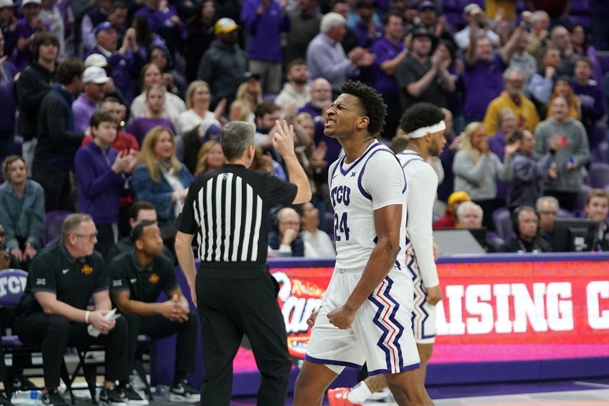 Feb 10, 2026; Fort Worth, Texas, USA;  TCU Horned Frogs forward Xavier Edmonds (24) reacts to a foul call in the games closing second against the Iowa State Cyclones during the second half at Ed and Rae Schollmaier Arena. Mandatory Credit: Raymond Carlin III-Imagn Images